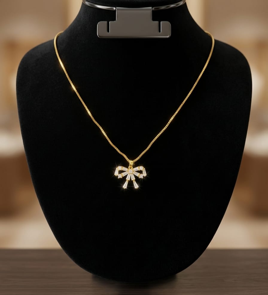 Gold-Tone Crystal Bow Necklace – Elegant Statement Jewelry