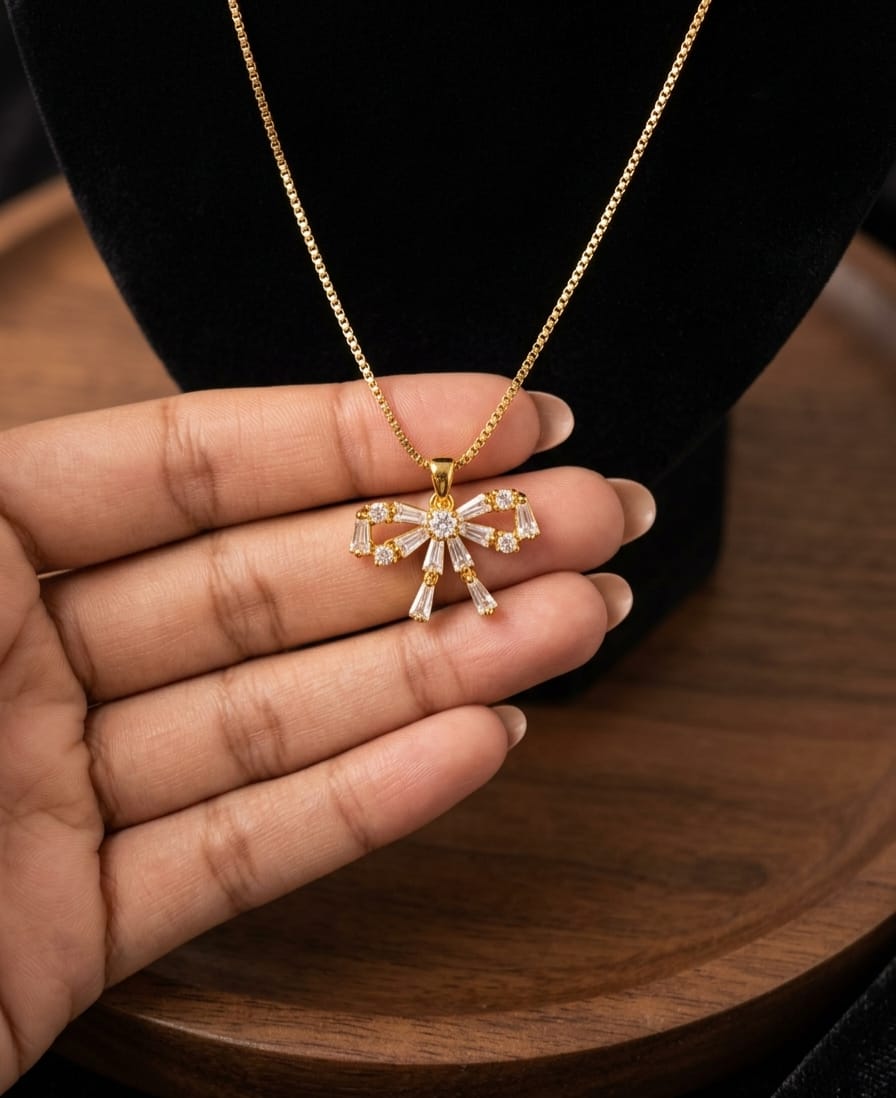 Gold-Tone Crystal Bow Necklace – Elegant Statement Jewelry