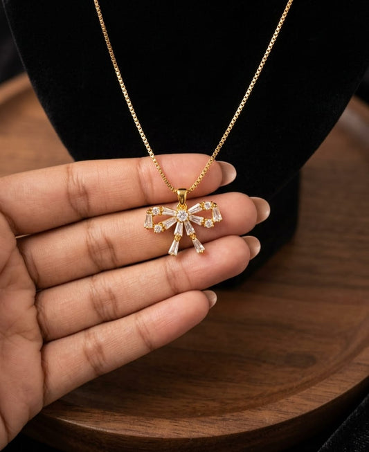 Gold-Tone Crystal Bow Necklace – Elegant Statement Jewelry
