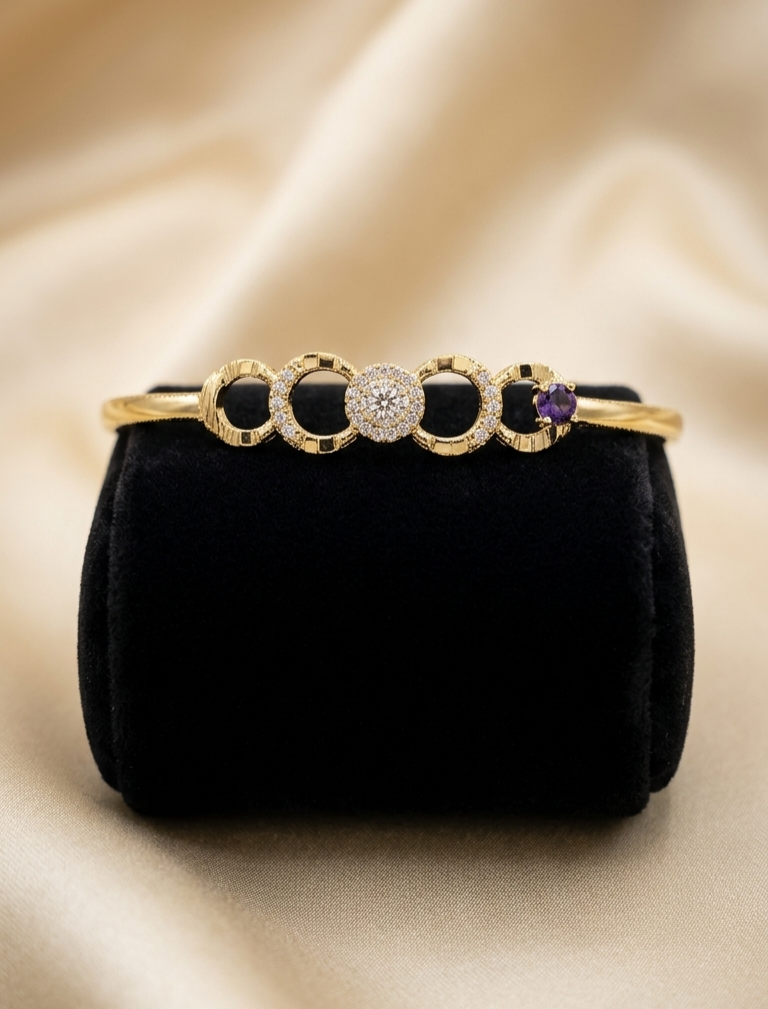 Luminous Link: 24k Gold Plated Emerald Accent Bangle