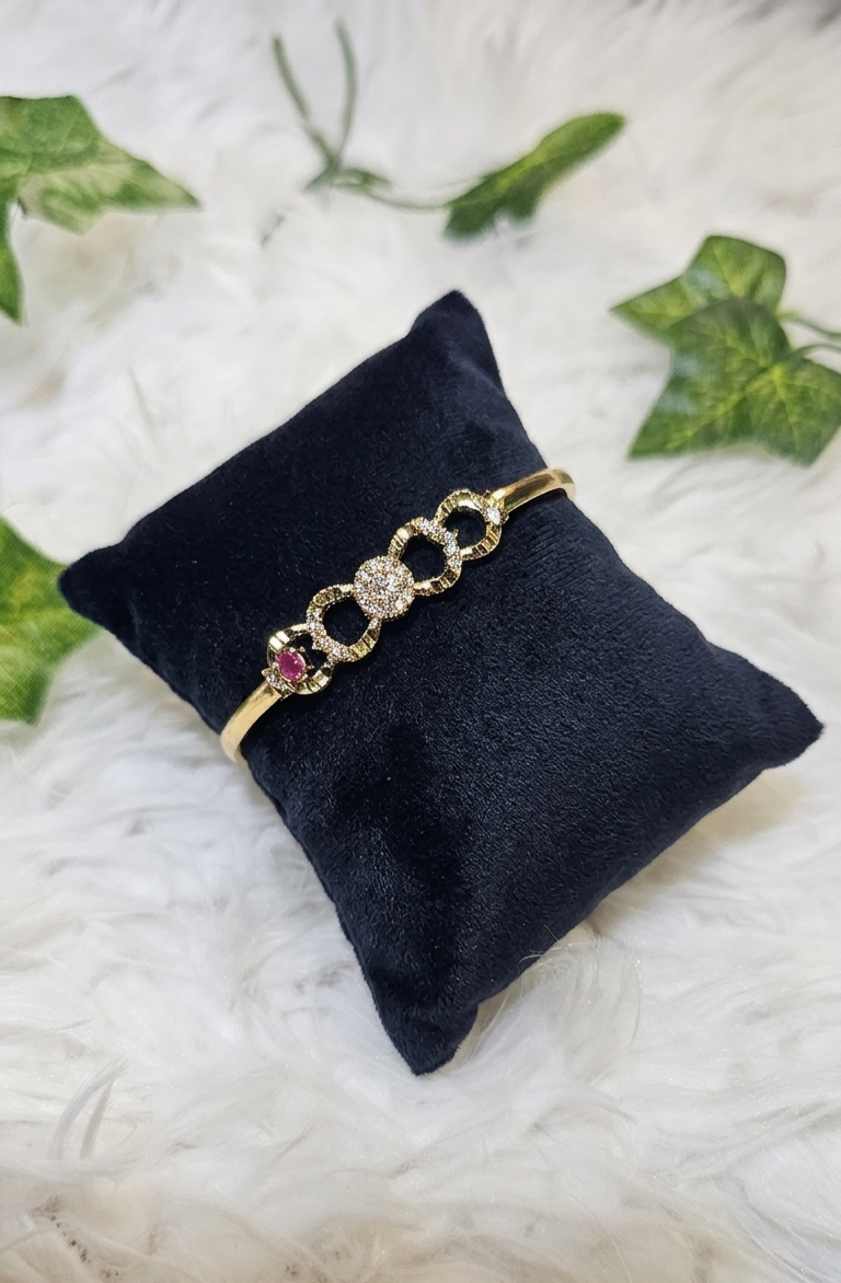 Luminous Link: 24k Gold Plated Emerald Accent Bangle